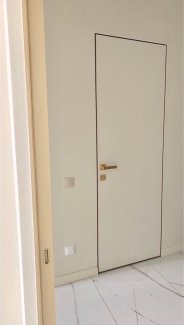 Двері Invisible приховані двері з алюмінієвими торцями золото 